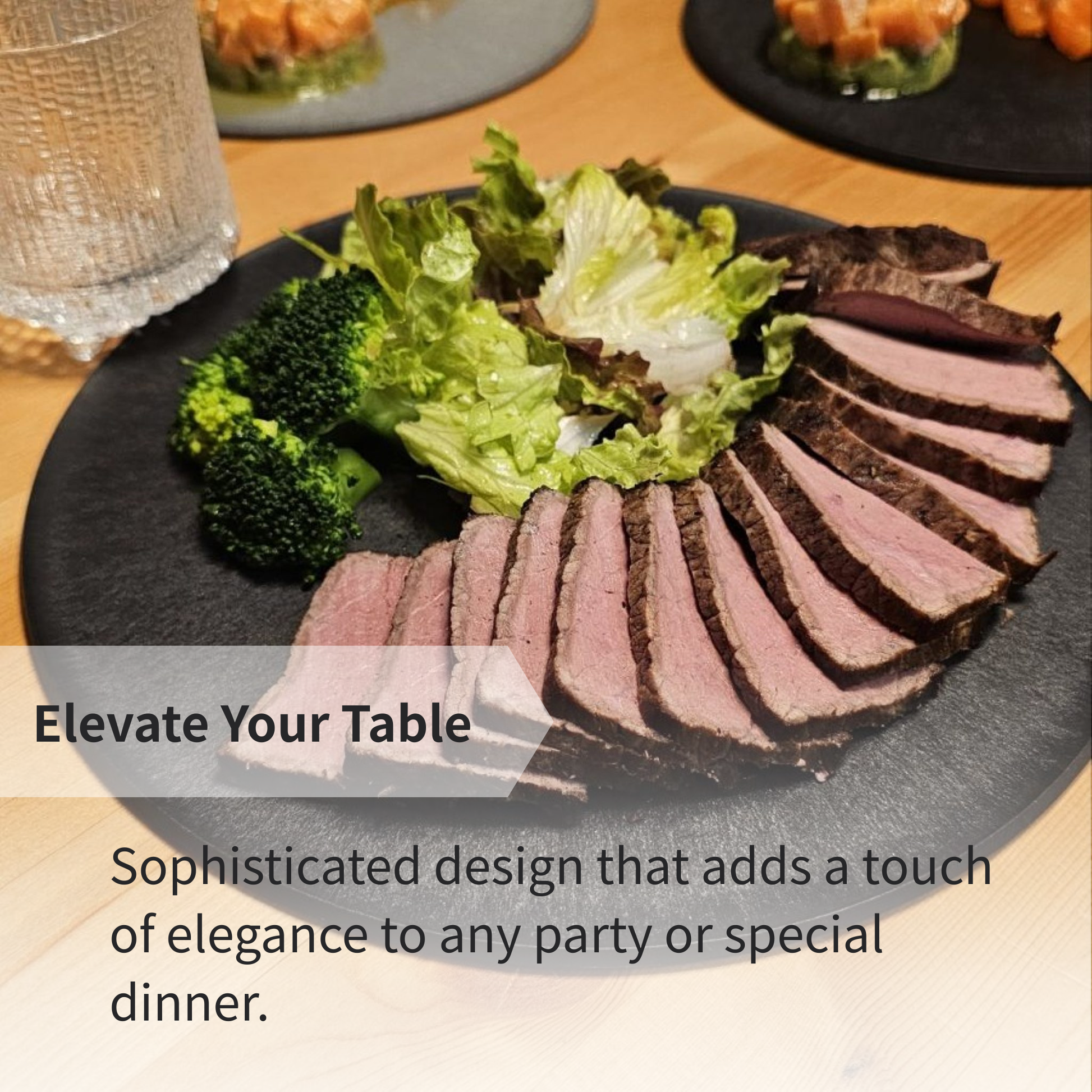Roast beef and fresh salad beautifully arranged on a black CHOPLATE, showcasing its elegance as a serving plate.
